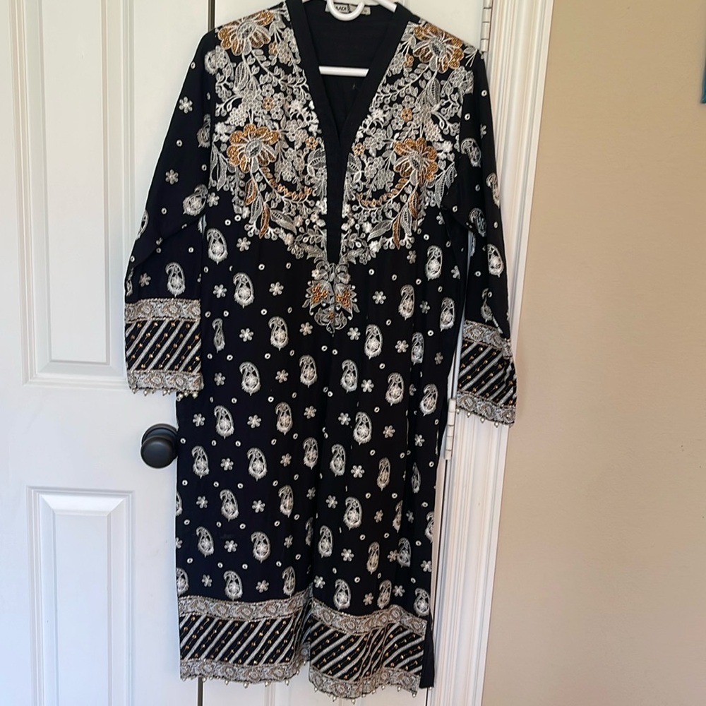 Indian Pakistani black kurta with white and gold embroidery from Khaadi.